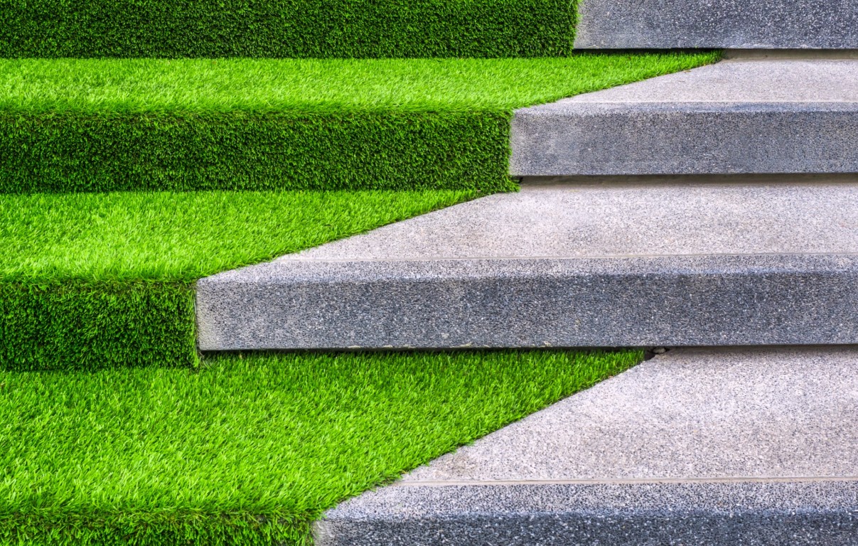 Mud-free artificial grass with paver installation in Carlsbad